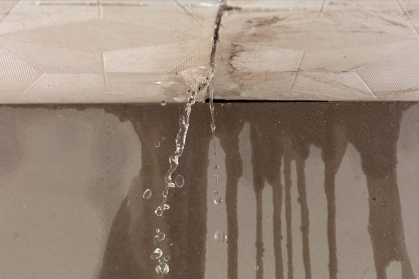 Professional Flood Damage Cleanup technician working in Cost, TX